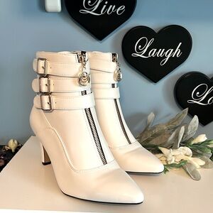 !D!FU brand white leather booties with a 2  inch heel-gold belted accents.